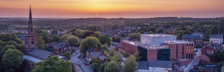 A landscape photograph of Shakespeare North Playhouse from above.